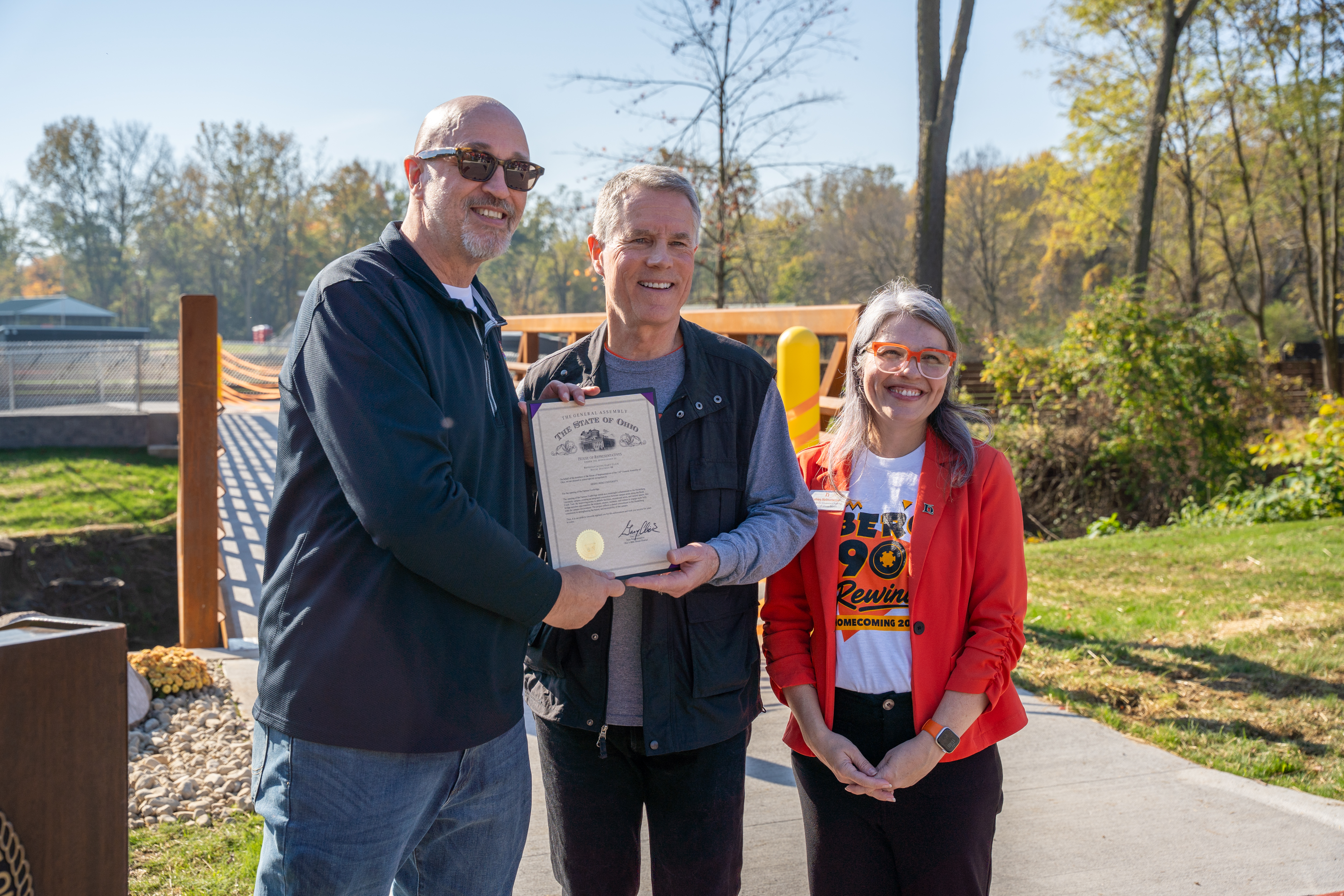 Rep. Gary Click presents recognition for the Farmen Footbridge
