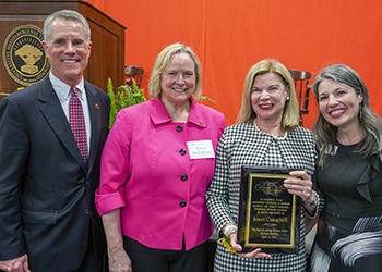 President Rob Huntington, Susan McCafferty and Ashley Helmstetter with PALS speaker Janet Campbell in April 2022.