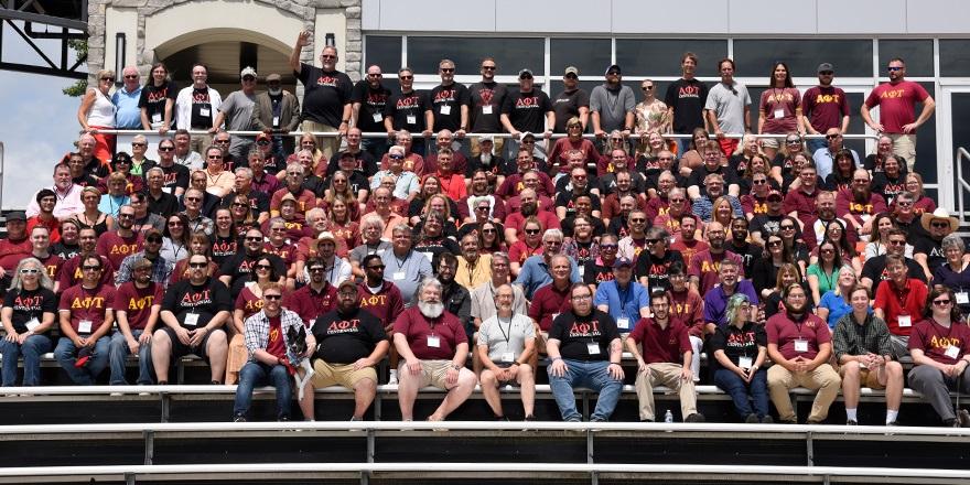 APs and Sisses gathered for a group photo in Hoernemann Stadium during their 100th anniversary celebration.