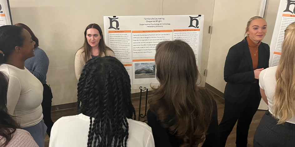 Students presenting their posters at the Behavioral Science Showcase