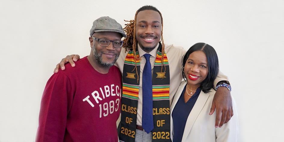 BSU member Martone Cole and his loved ones celebrate his receiving his kente on Friday. The kente will be work with his graduation regalia on May 15.
