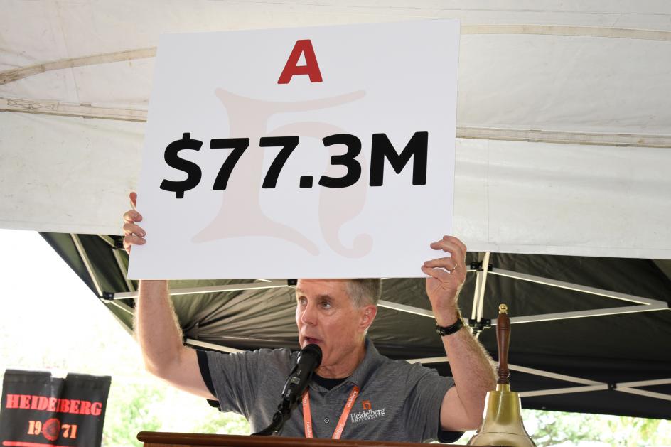 President Rob Huntington reveals the record-setting ACCE total during the Alumni Weekend luncheon on June 19.