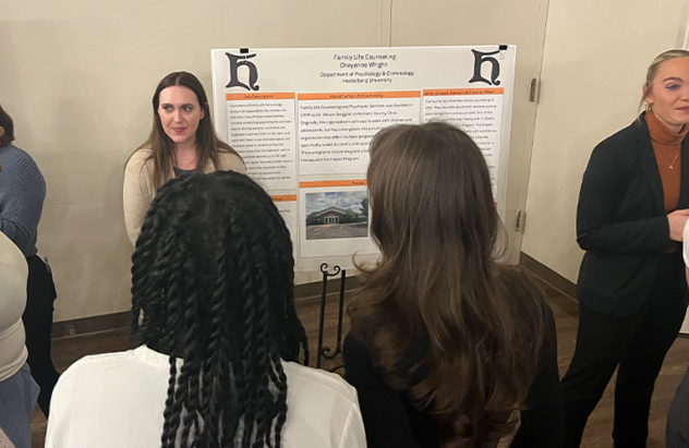 Students presenting their posters at the Behavioral Science Showcase