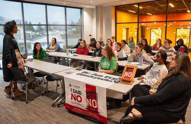 Dr. Jen Fry speaks to class