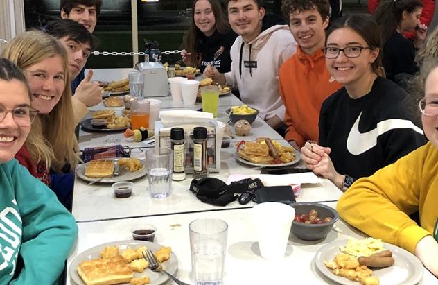 Students enjoy a stress-relieving Late Night Breakfast before launching into final exams.