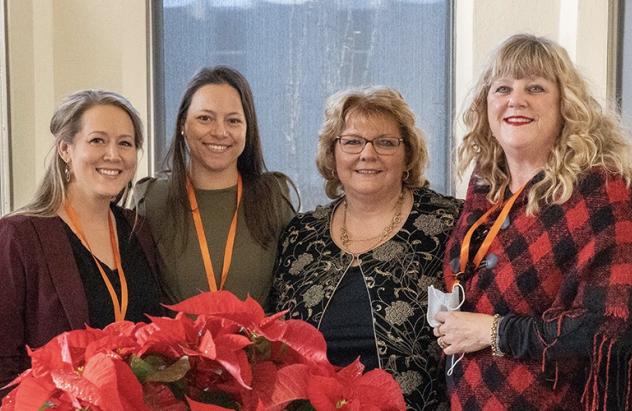 First-ever RN-BSN grads receive pins from Dr. Karen Estridge