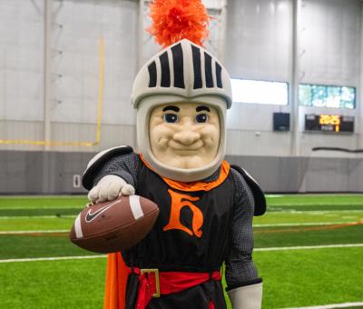 Siggy holding a football