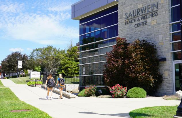 students walking on campus