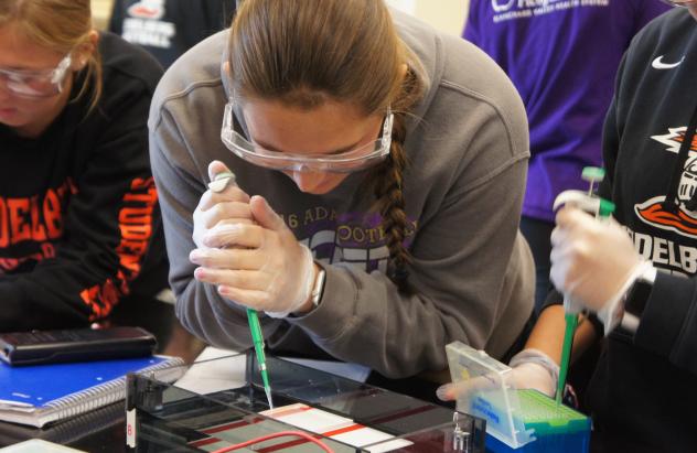 student with pipette 
