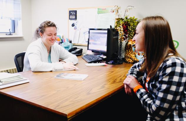 student with counselor