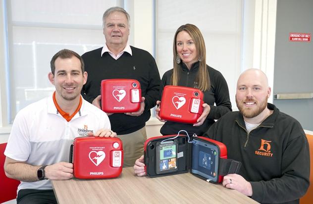 Tyson Depinet, Bob Fruth, Janelle Baldosser, Jake McGraw with new AEDs