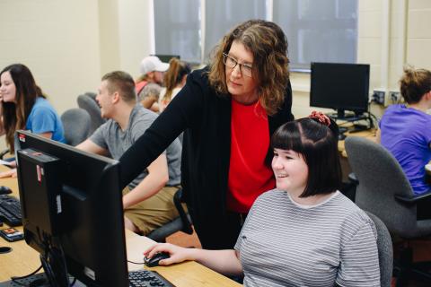 Ginny Gregg with student