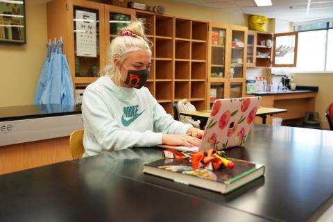 student on computer